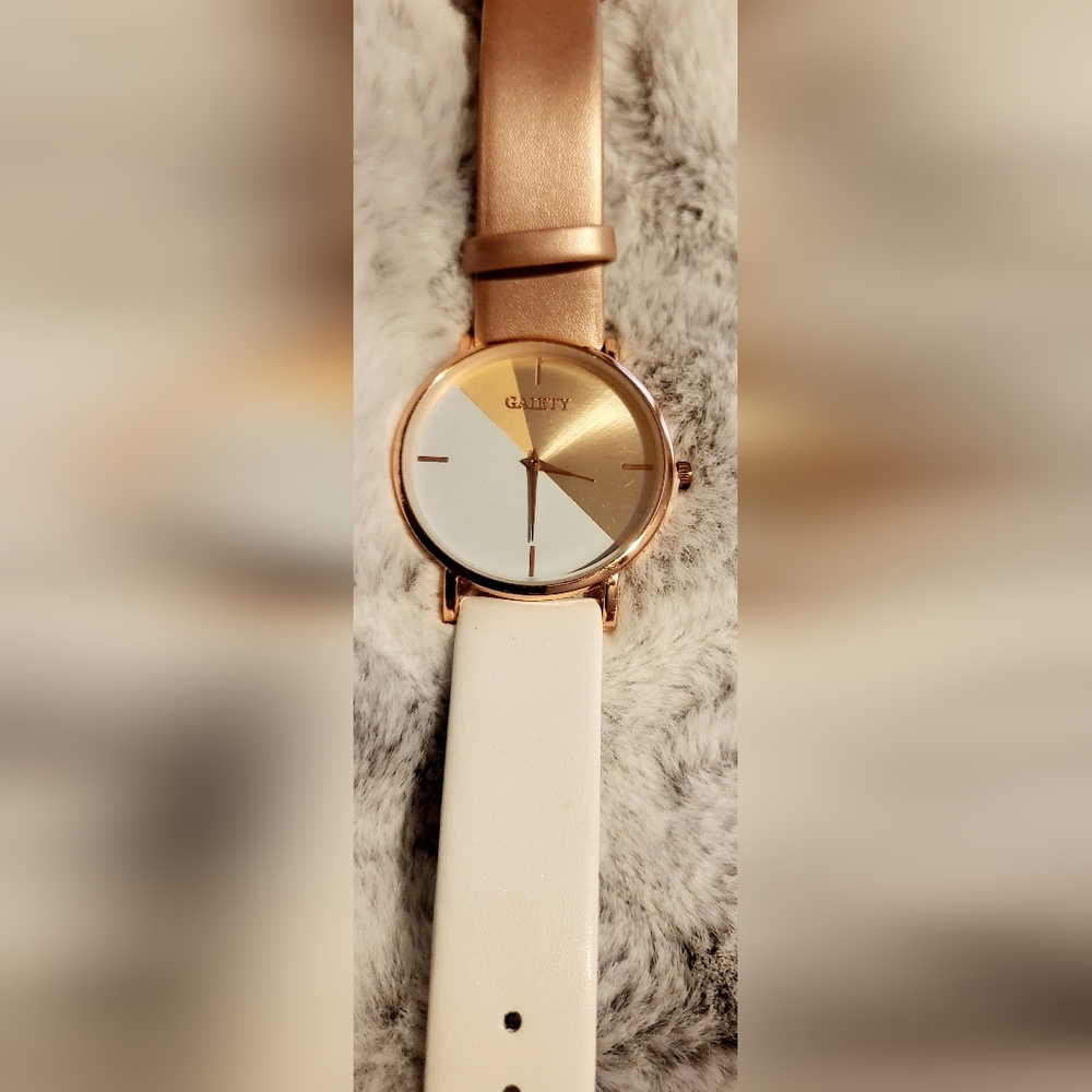 Luxurious gold, rose gold, cream watch. Gaitey